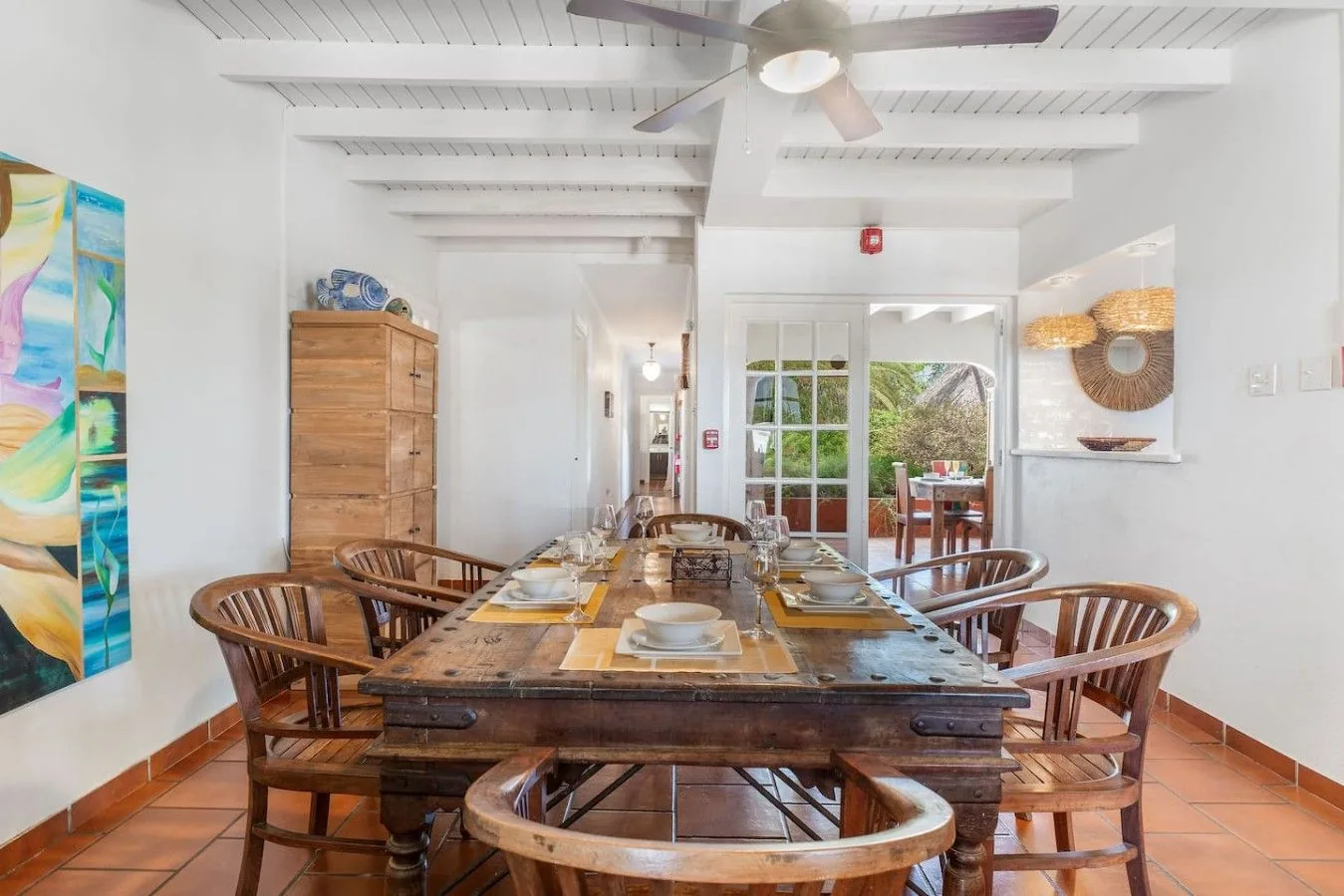 Large indoor dining table for families and groups at Villa Nirvana