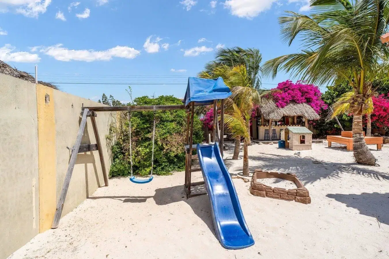 Private playground in the enclosed garden at Villa Nirvana